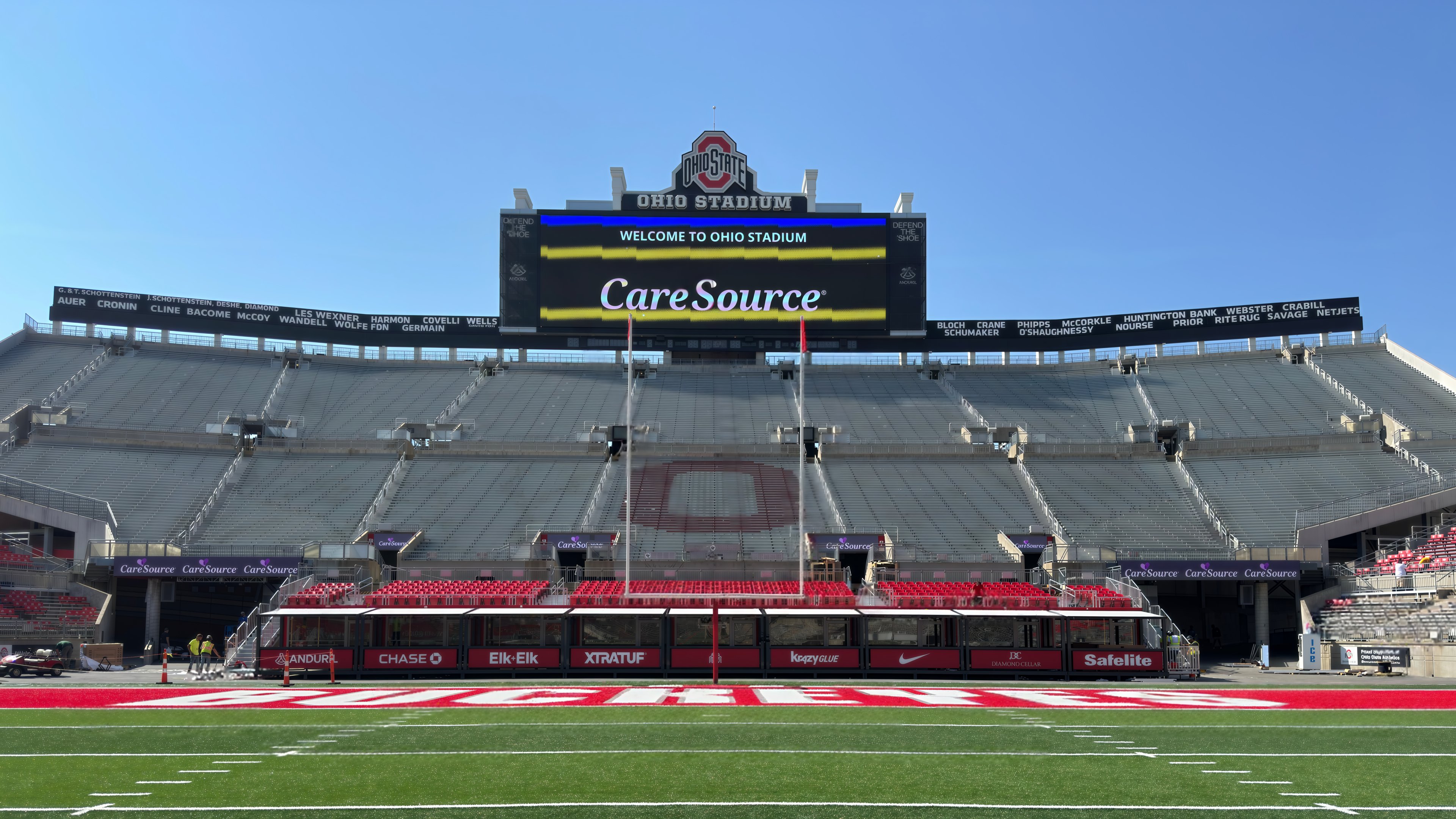 Front view of the red VIP suites beneath the Ohio Stadium scoreboard